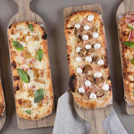 멜리아 바르셀로나 사리아 호텔 외부 사진 Pizza